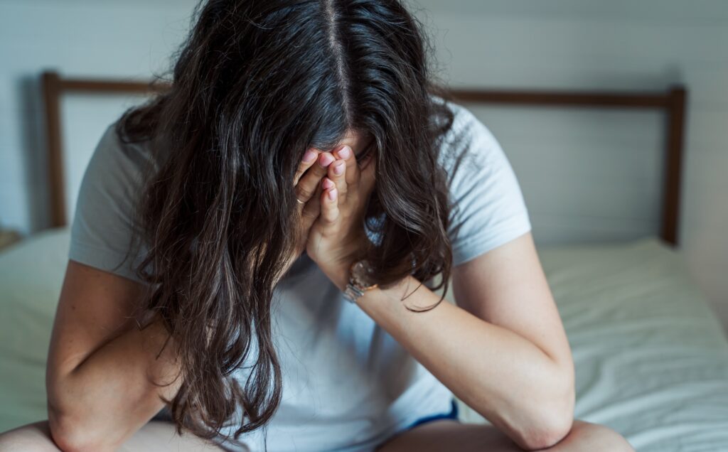 Sad, unhappy woman in depression. Stress, anxiety, tension, psychological problems. Poor mental heal